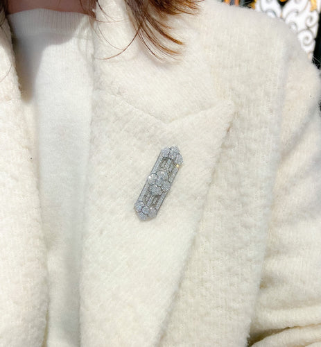 Broche Broche en platine et diamants 58 Facettes 1