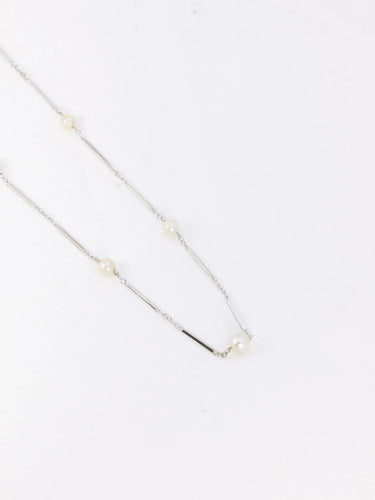 Collier Collier chaîne vintage or blanc perles 58 Facettes 941