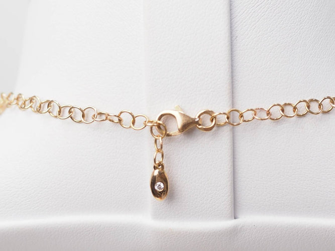 Collier Collier boules rigide et trèfles en or rose et diamants 58 Facettes 33100