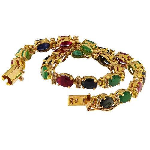 Bracelet Bracelet de tennis vintage en or jaune 18 carats orné d'émeraudes, de rubis, de saphirs et de diamants 58 Facettes G3881