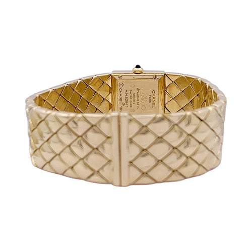 Montre Montre Chanel, "Matelassée", or jaune. 58 Facettes 33626