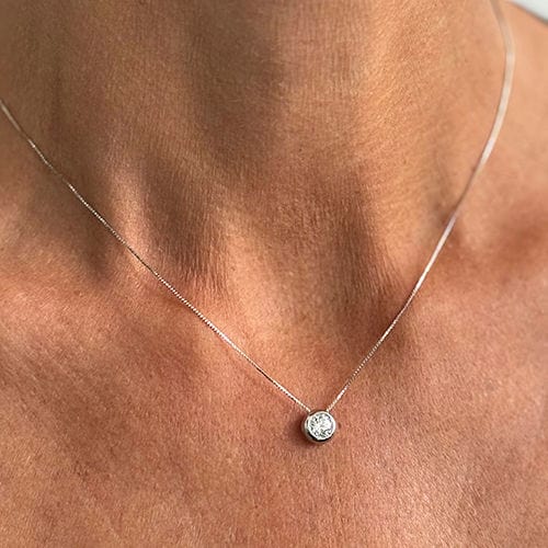 Collier Collier en or blanc avec un diamant de 0,44 ct 58 Facettes 50