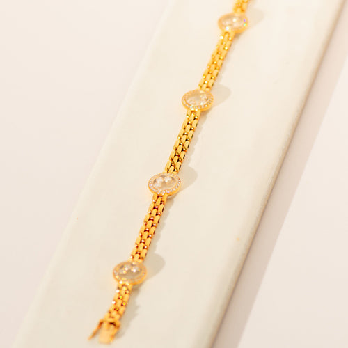 Chopard „Happy Diamonds“ Armband aus 18 Karat Gelbgold | 96 Diamanten & 12 lose Brillanten | Dreireihiges Gliederarmband | 18cm 58 Facettes 3282