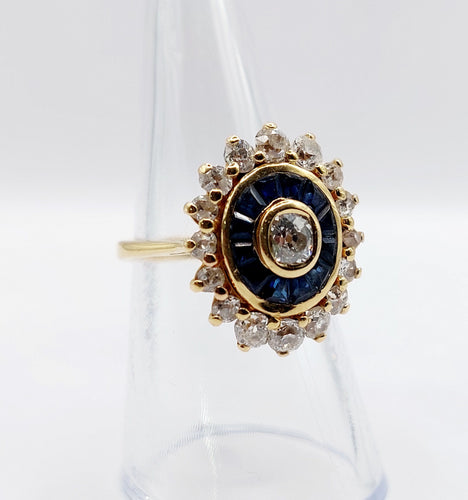 Bague 54 Bague marguerite art déco or jaune, diamants et saphir calibrés 58 Facettes A05533