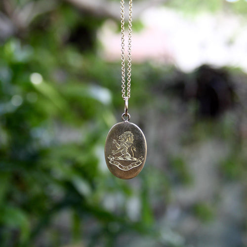 Victorian gold lion charm pendant hand-engraved with Ave Maria 