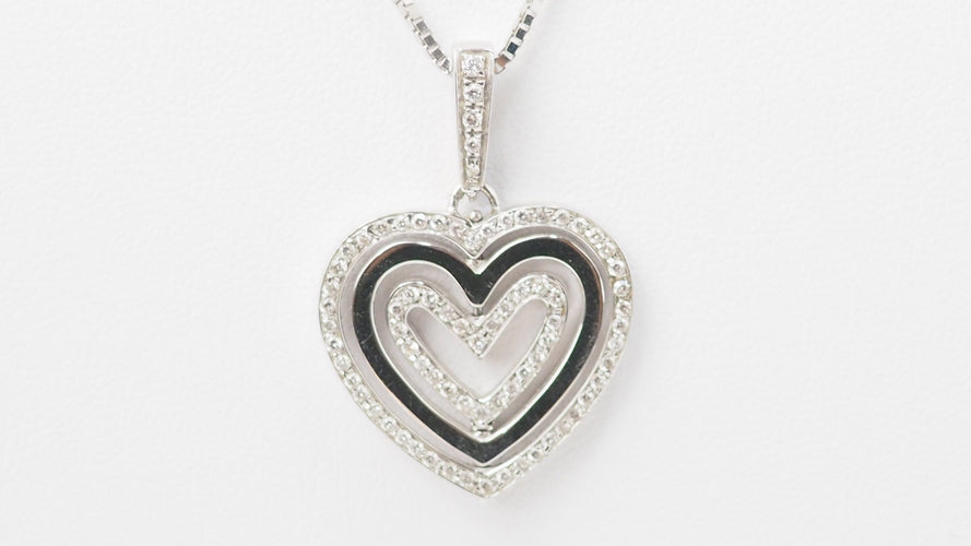 Collier Collier pendentif multi Coeurs en or blanc et diamants 58 Facettes 21089