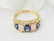 Bague 56.5 Bague jarretière en or jaune, saphirs et pierres de lune 58 Facettes 33246