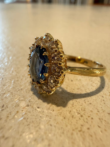 Yellow gold, blue sapphire and diamond ring 58 Facettes