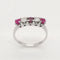 Bague 54 Bague en or 18 carats, rubis et diamants 58 Facettes