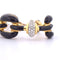 Bracelet David Webb - Bracelet à mailles en or jaune 18k, smalto nero et diamants 58 Facettes BR112