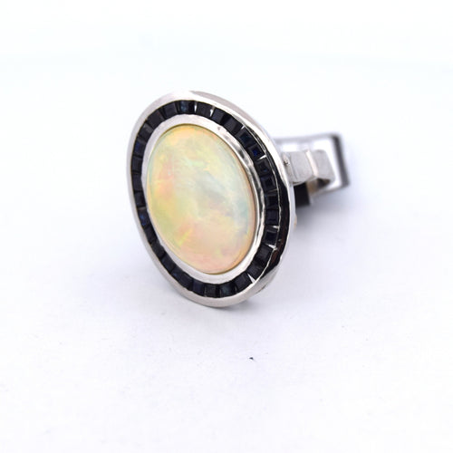 Bague 54 Bague en platine ornée d'opale, d'onyx et de saphirs 58 Facettes