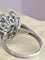 Bague 53 BUCHERER - Bague florale en or blanc et diamants 58 Facettes