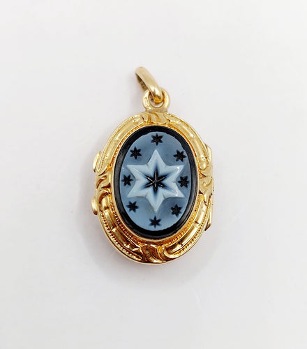 Pendentif Pendentif porte photo souvenir antique or jaune 18k plaques noires, croix et étoiles (circa 1900) 58 Facettes A06198