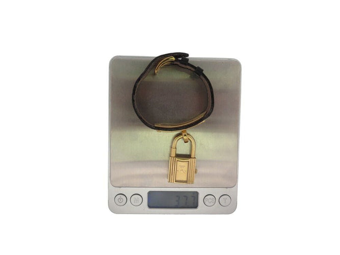 Montre montre vintage HERMES Kelly Mini Cadenas 20 mm plaque or quartz dame 58 Facettes 268902