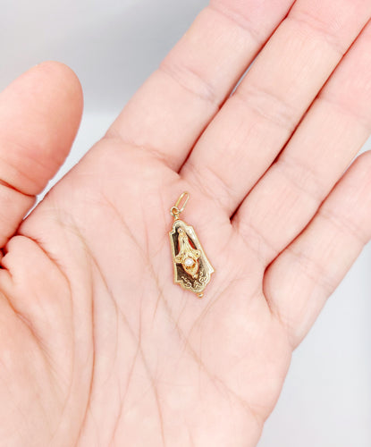 Pendentif Pendentif or rose, or jaune orné d'une perle (circa 1900) 58 Facettes A06292