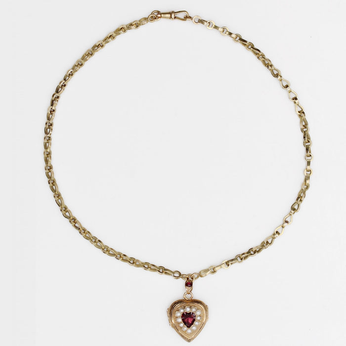 Antique chain and its heart-shaped medallion with garnets and fine pearls