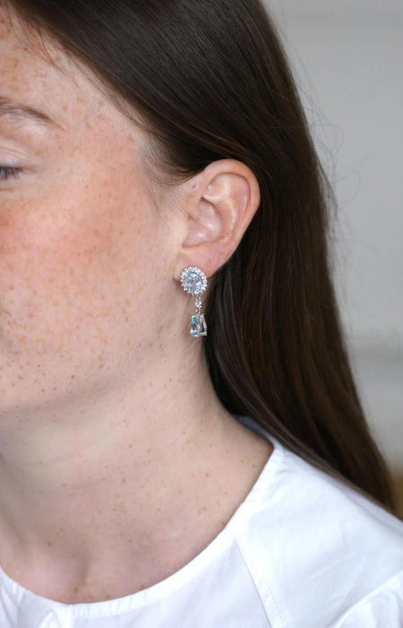 White gold, blue topaz, diamond drop earrings