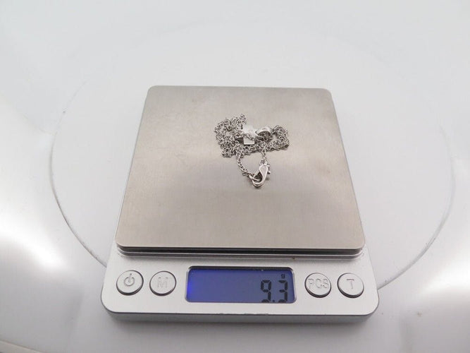 Collier collier POMELLATO pendentif croix diamants en or blanc 58 Facettes 259931