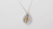 Collier Collier en or blanc, citrine et diamants 58 Facettes 32805