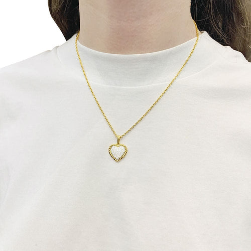 Pendentif Pendentif vintage Van Cleef & Arpels, "Coeur", or jaune, diamants. 58 Facettes 33777