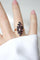 Bague 55 Bague Marquise Ancienne en Or Rose et Grenats sur Paillon 58 Facettes