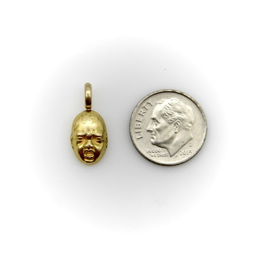 Pendentif Pendentif/breloque vintage en or 18 carats représentant un visage de bébé qui pleure 58 Facettes A2002M