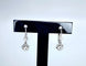 Boucles d'oreilles Boucles d’oreilles dormeuses en or blanc en pierres blanches 58 Facettes AB320
