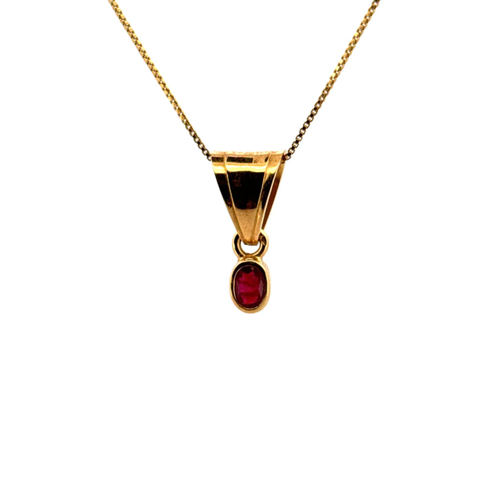 Yellow gold and ruby pendant
