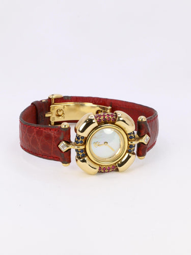 Montre RENE BOIVIN Montre Chrysalide or jaune rubis saphirs diamants 58 Facettes 1089.1