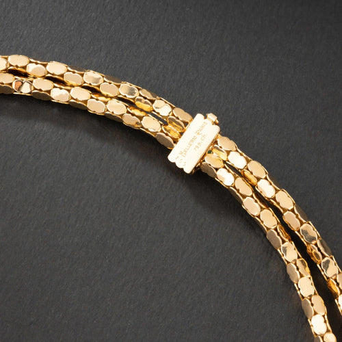 Collier Collier en or jaune 18K à deux rangs, signé MELLERIO. 58 Facettes