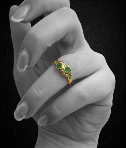 Bague Bague sinueuse ornée d'émeraudes et de diamants 58 Facettes