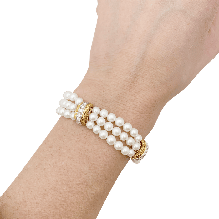 Bracelet Van Cleef & Arpels, deux ors, diamants, perles. 58 Facettes 34207