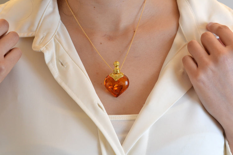 Pendentif Pendentif vintage ambre et or 21k 58 Facettes 26674