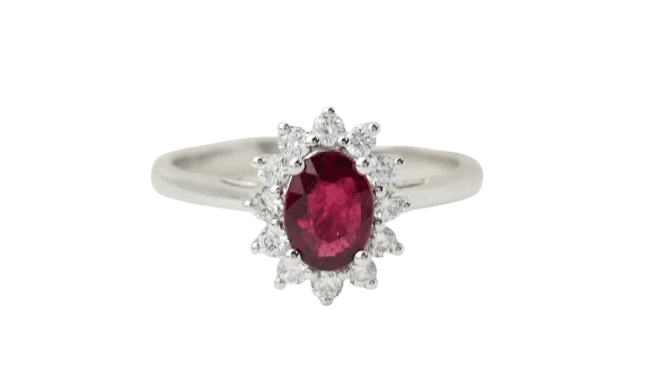 Bague 54 Bague entourage en or blanc, rubis et diamants 58 Facettes 32945