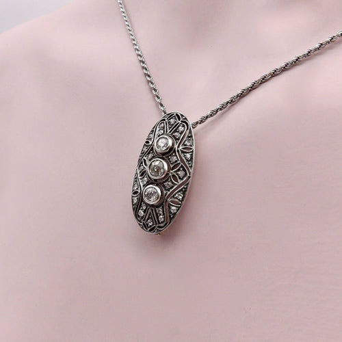 Broche broche ou pendentif ovale en argent et diamant avec dos en or 58 Facettes