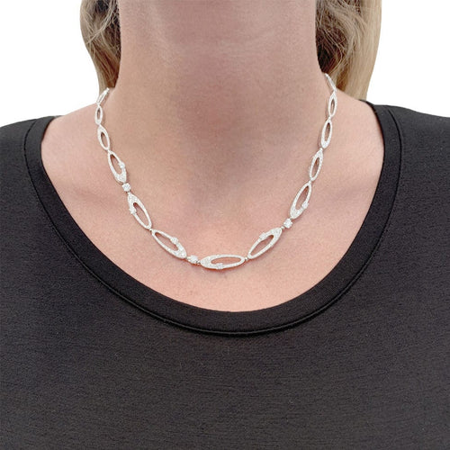 Collier Collier Bulgari "Elisia", or blanc et diamants. 58 Facettes 33403