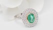 Bague 54 Bague double entourage en or bicolore, émeraude ovale et diamants 58 Facettes 32849