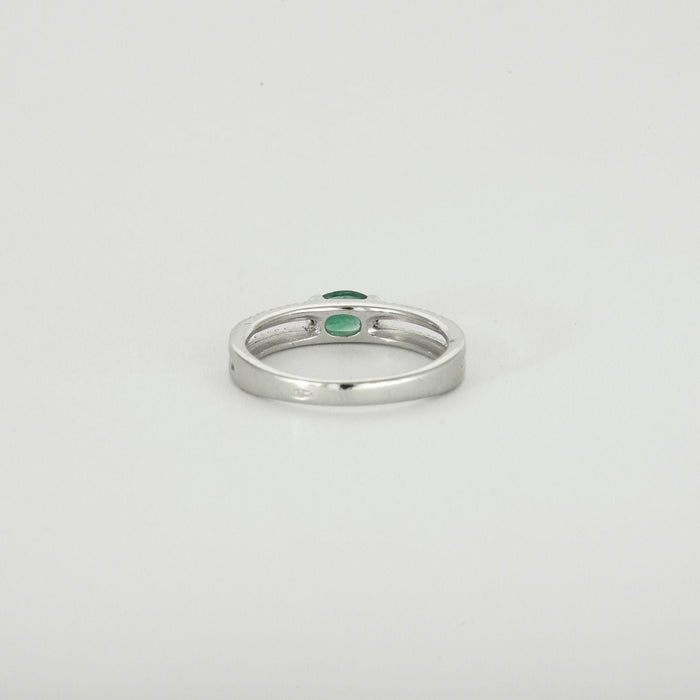 White gold emerald and diamond ring