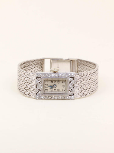 Montre Montre Art Déco or blanc diamants 58 Facettes 1181.7