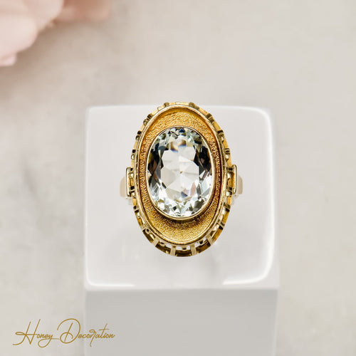 Bague 55 Charmante bague vintage ornée d'une aigue-marine dans un élégant sertissage 58 Facettes 2611