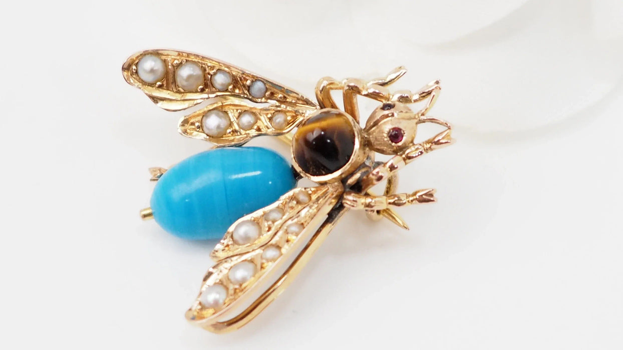 Broche Broche mouche en or jaune turquoise, oeil de tigre et perles fines 58 Facettes 32820