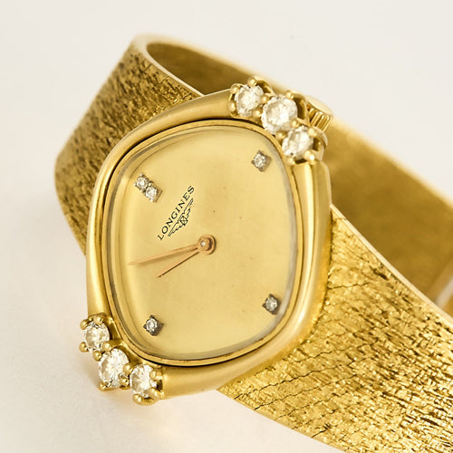 Montre Longines  montre dame en or jaune et diamants 58 Facettes ENG11389