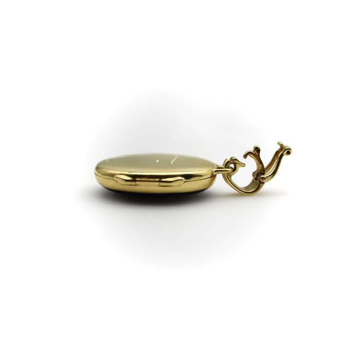 Gold diamond guilloche enamel medallion Fabergé