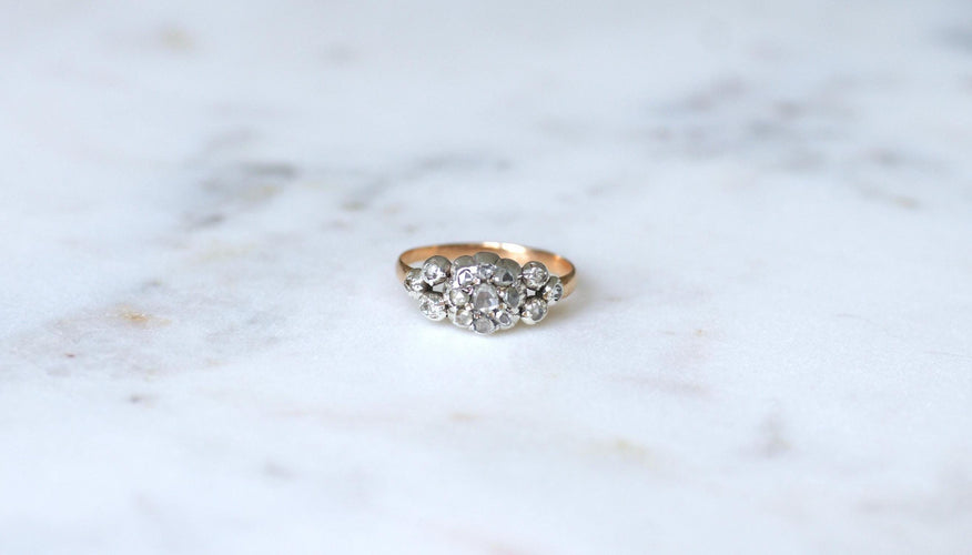 Bague Ancienne bague jarretière Marguerite diamants 58 Facettes