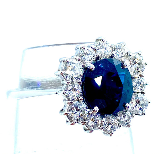 Bague Bague hexagonale sertie de diamants et ornée d'un saphir central 58 Facettes