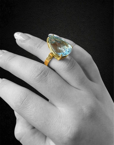 Bague Bague artisanale ornée d'une topaze bleue 58 Facettes