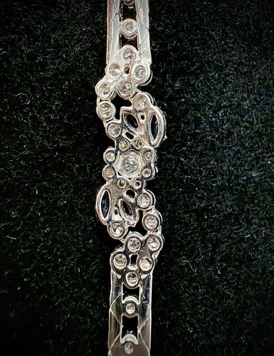 Bracelet Bracelet maille en écailles serti de brillants et saphirs 58 Facettes