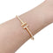 Bracelet Bracelet Tiffany "Wire Tiffany T" en or rose et diamants. 58 Facettes 34827