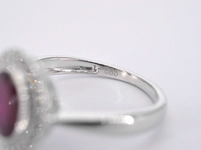 Bague 54 Bague entourage en or blanc avec diamants et rubis 58 Facettes 2060