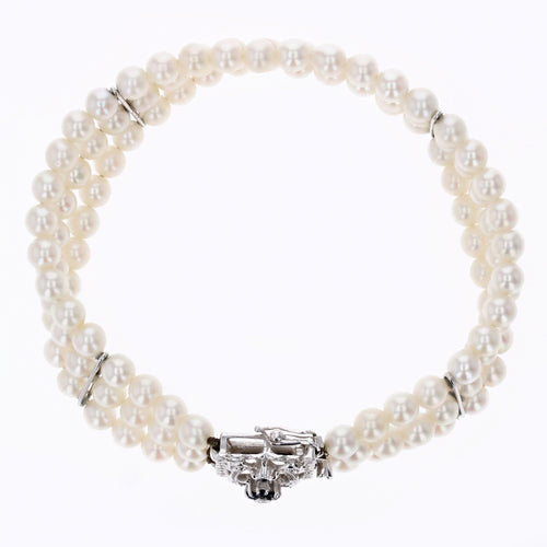 Bracelet Bracelet 3 rangs de perles et son fermoir en or blanc 58 Facettes 24-210